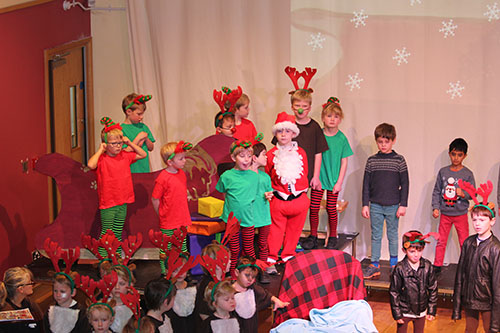 Pre-preparatory school students performing a play, showcasing their creativity and dramatic abilities in a school production