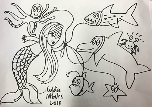 A drawing of a mermaid playing with sea animals