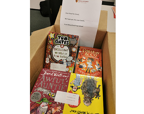 A box of books to be given to charity