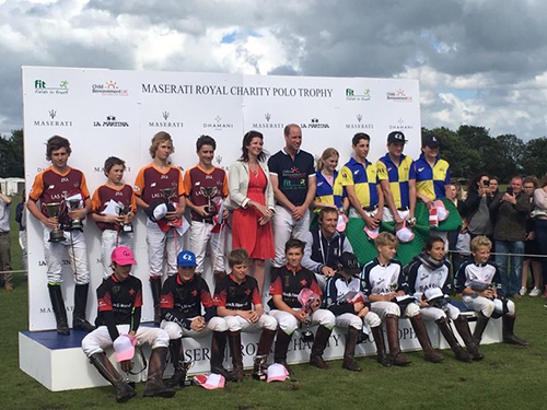 Students posing with their awards and trophies at the U15 tournament at Beaufort Polo Club